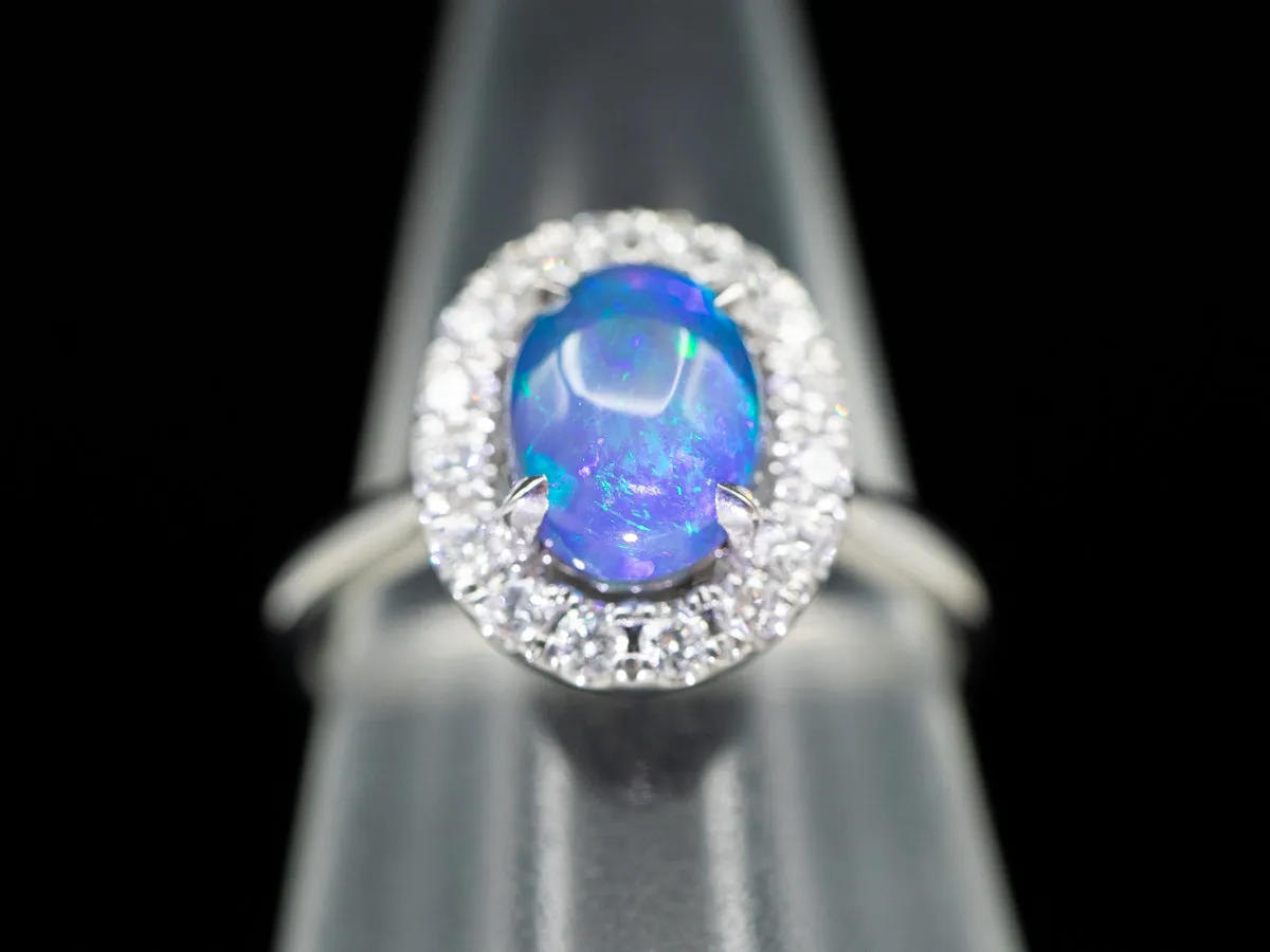 18K White Gold Black Opal Oval and Diamond Halo Ring